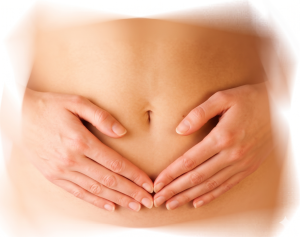 Hands framing the navel with thumbs pointing toward each other on the lower abdomen for Chi Nei Tsang belly massage